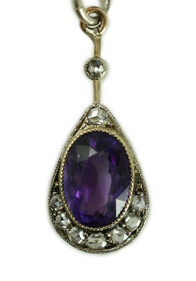 A Victorian gold and silver, amethyst and diamond set teardrop shaped pendant